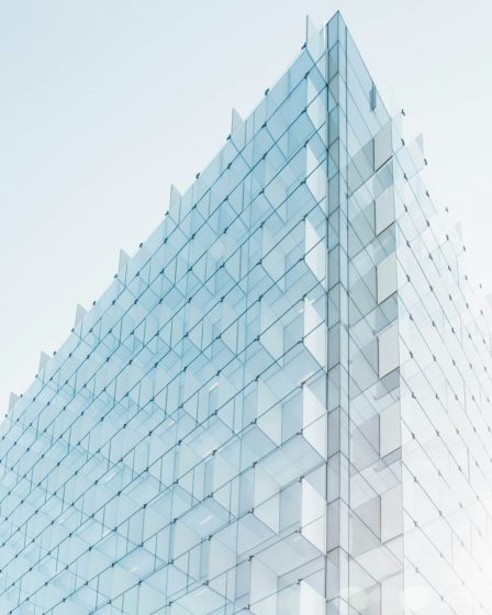 glass building under clear blue sky